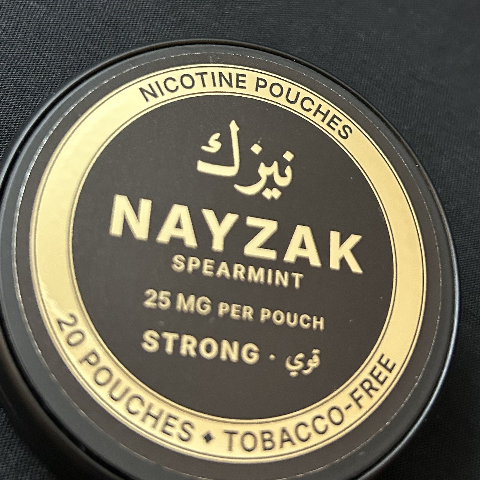 Close-up of the gold lid artwork.