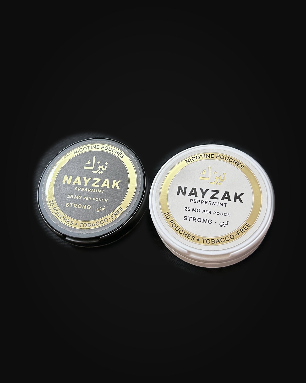 Two NAYZAK cans side by side — black and white.